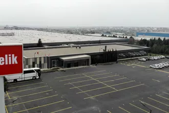 S&P Arçelik'in kredi notunu düşürdü